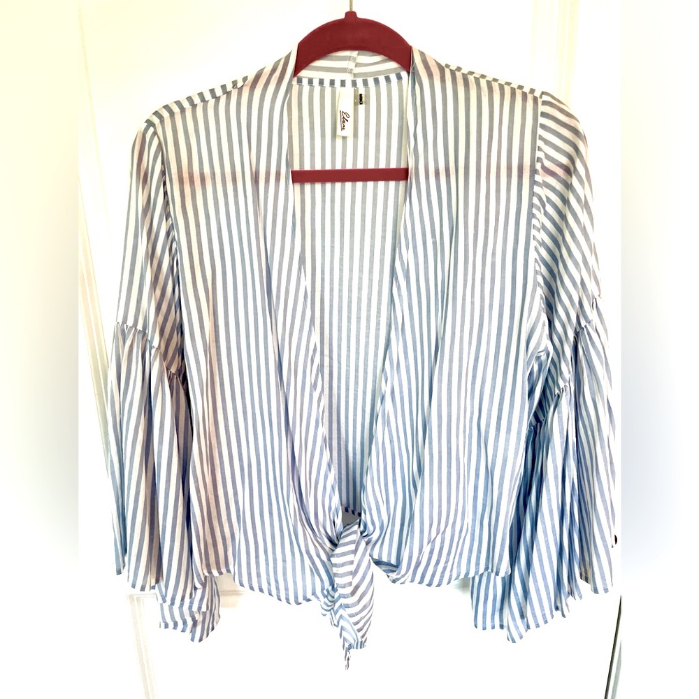 - Elan wrap top with flouncy sleeves